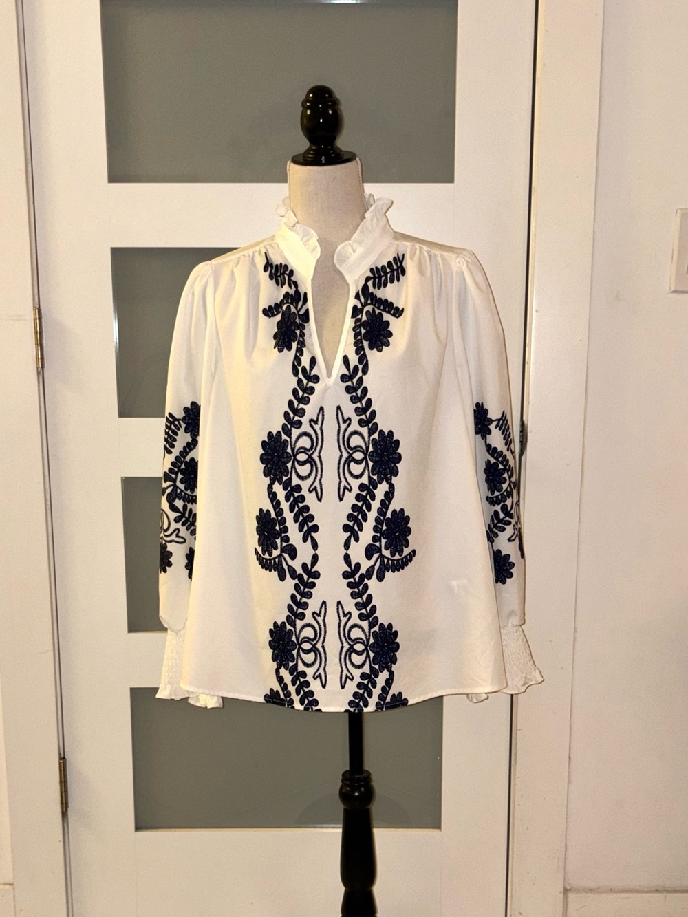 SHEIN White Blouse with Navy Blue Embroidered Floral Design